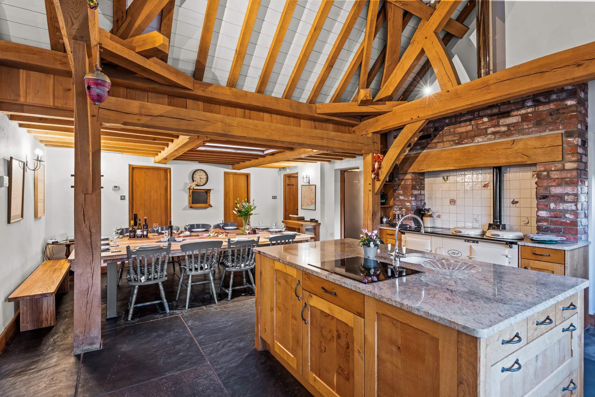 The kitchen/dining-room is exceptionally spacious and leads directly onto the patio area. Perfect for serving up a delicious barbecue.