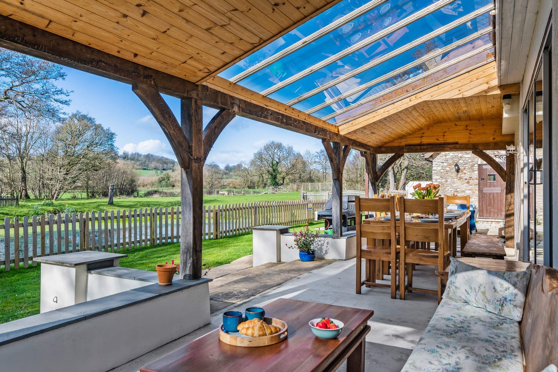 You can enjoy the outside whatever the weather under the covered veranda.