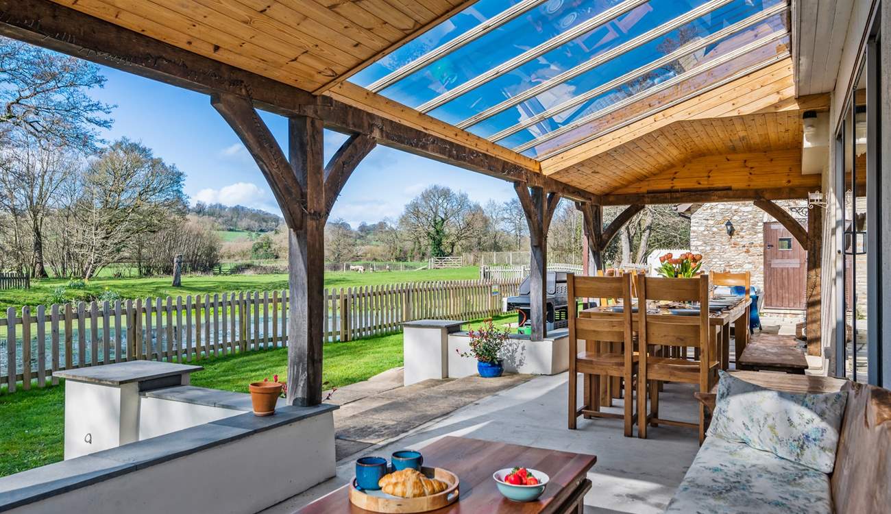 You can enjoy the outside whatever the weather under the covered veranda.