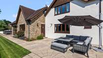 Soaking up the sun in this beautiful fully enclosed area is the perfect way to spend the day.