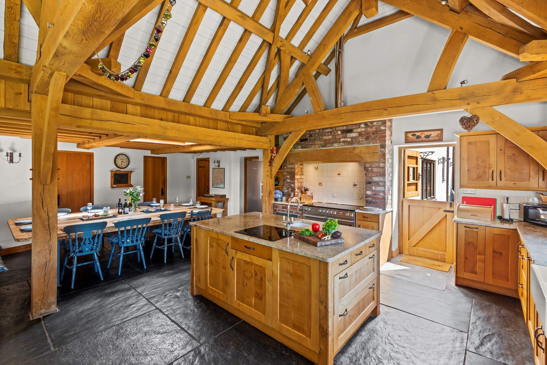 The kitchen/dining-room is exceptionally spacious and leads directly onto the patio area. Perfect for serving up a delicious barbecue.