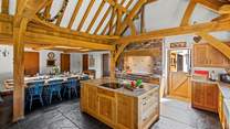 The kitchen/dining-room is exceptionally spacious and leads directly onto the patio area. Perfect for serving up a delicious barbecue.