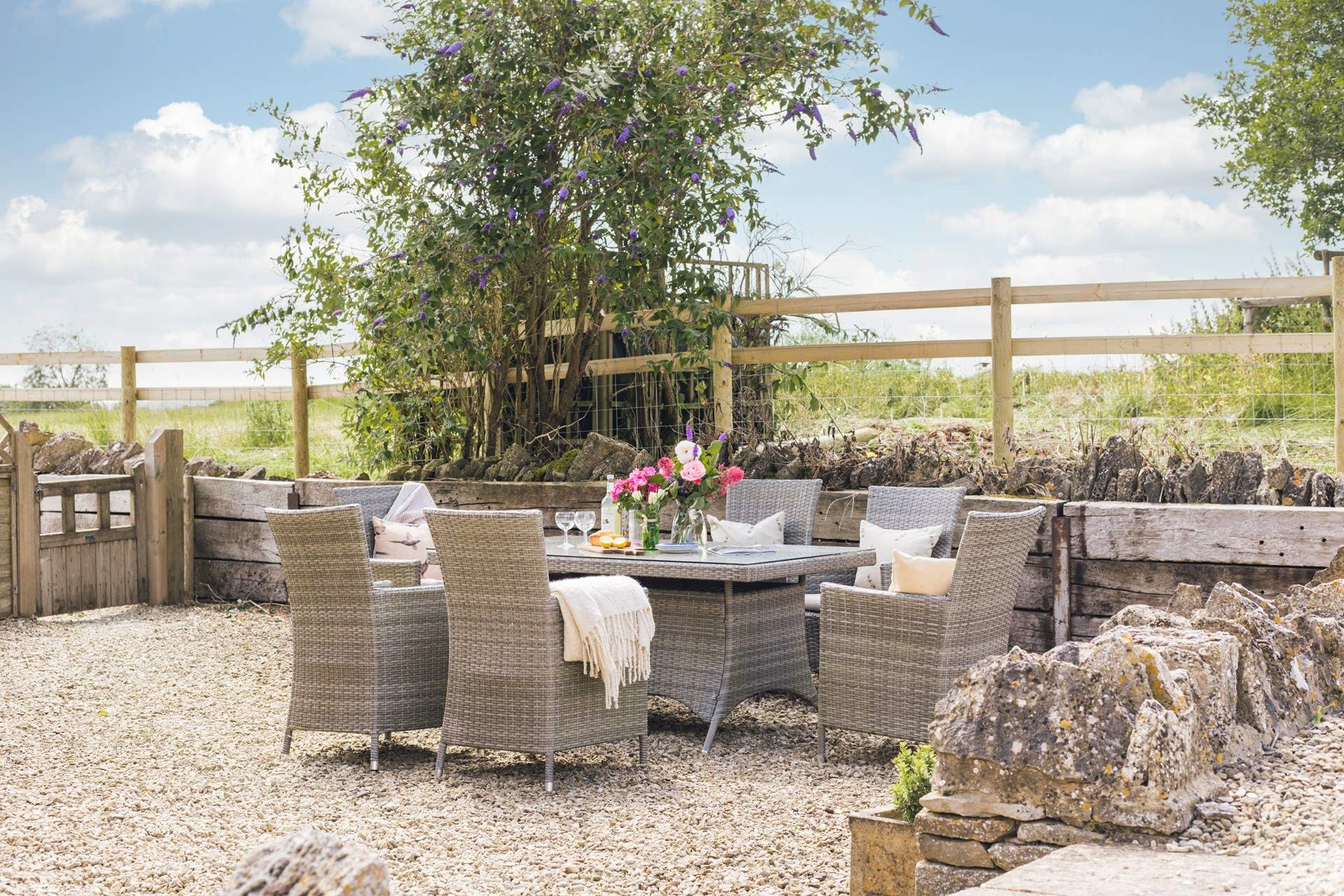 Unwind in the pretty garden surrounded by beautiful Cotswold countryside.