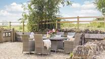 Unwind in the pretty garden surrounded by beautiful Cotswold countryside.