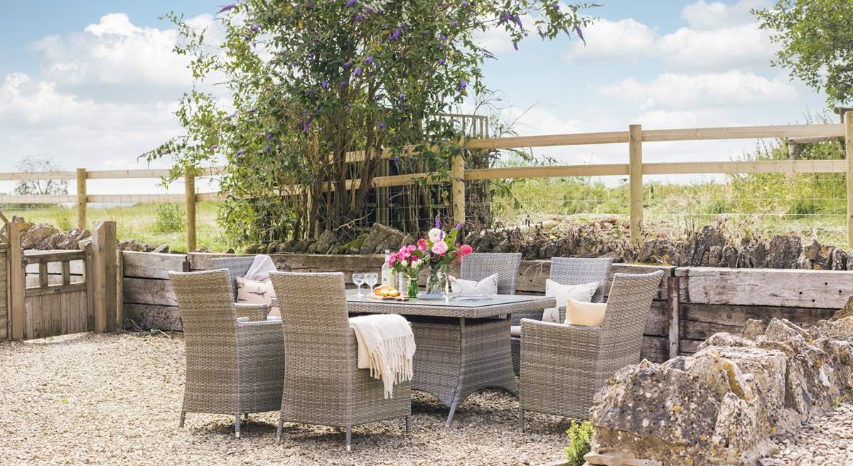 Unwind in the pretty garden surrounded by beautiful Cotswold countryside.