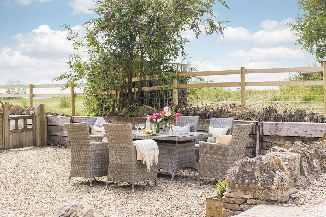 Unwind in the pretty garden surrounded by beautiful Cotswold countryside.