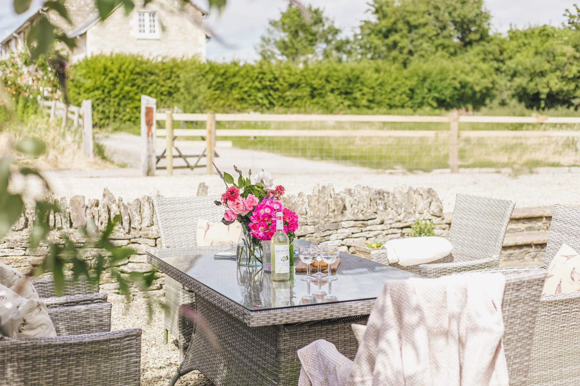 Enjoy a glass of wine is the fresh country air.