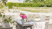 Enjoy a glass of wine is the fresh country air.