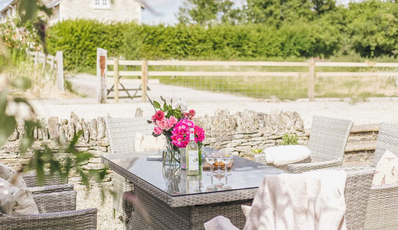 Enjoy a glass of wine is the fresh country air.