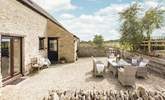 The pretty gravelled outside space is perfect for al fresco dining. - Thumbnail Image