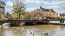 Bourton-on-the-Water is a popular destination with the gently flowing River Windrush running through the centre of the village and crossed by attractive little bridges. 