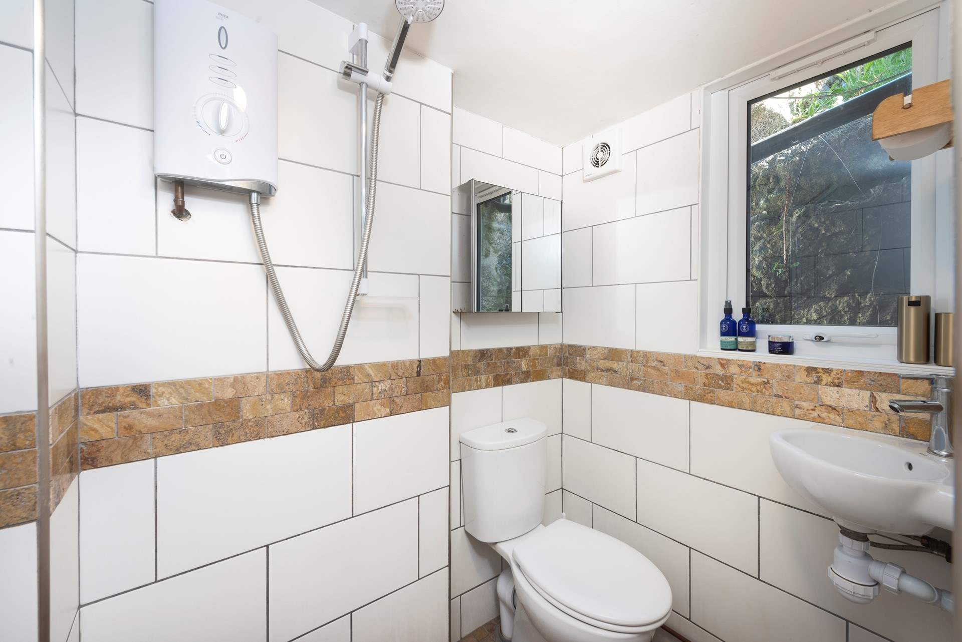 A simple wet-room to wash away your day.