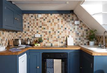 A cute kitchen to cook up a feast.