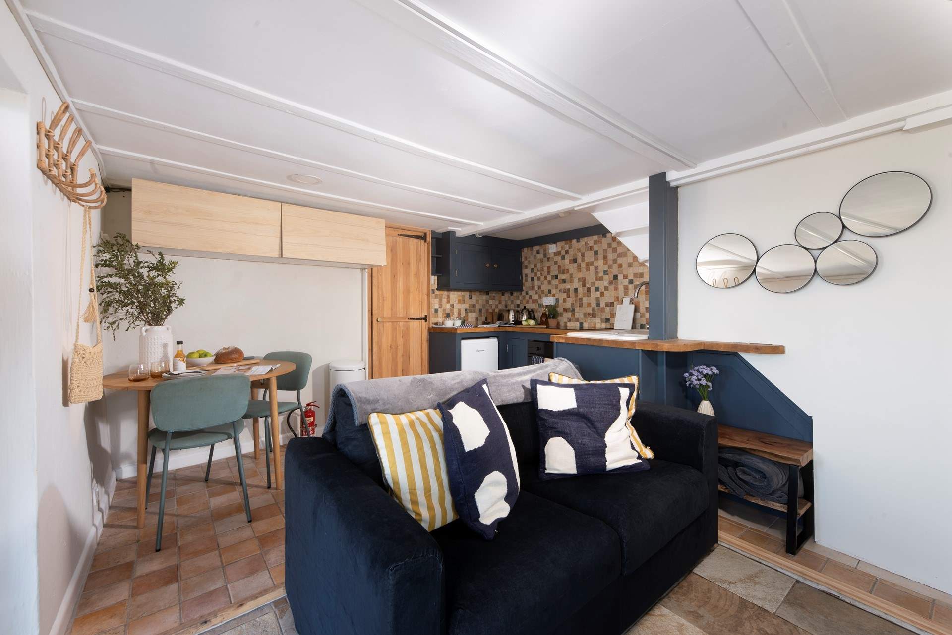 A snug, cosy open plan living area.