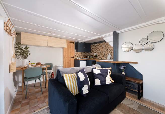 A snug, cosy open plan living area.