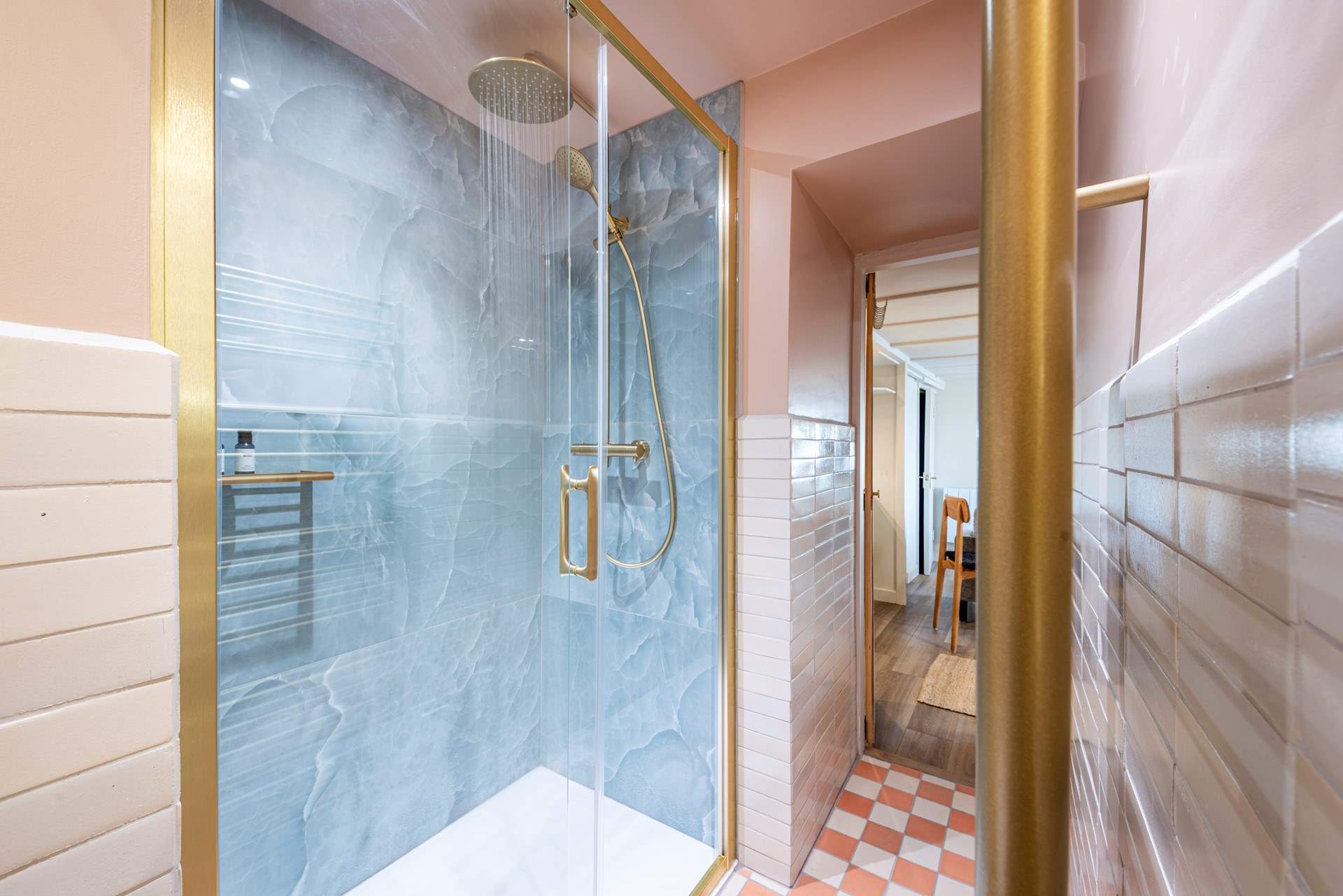 The shower leading into the open plan area.