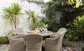 Enjoy al fresco dining in the pretty courtyard.  - Thumbnail Image