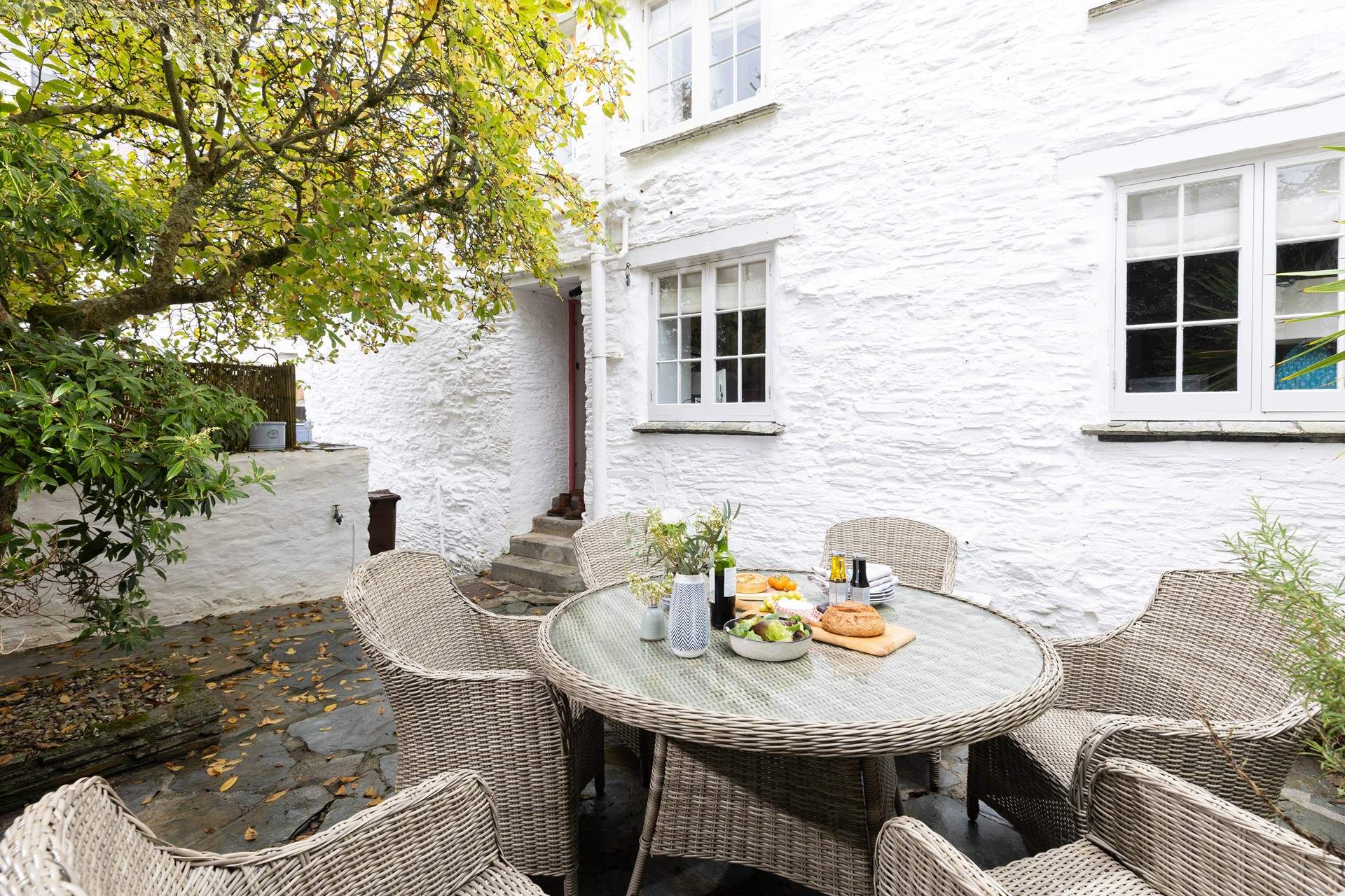 Enjoy the secluded patio from dawn until dusk.