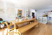 The large kitchen/dining-room has plenty of space for the whole family.