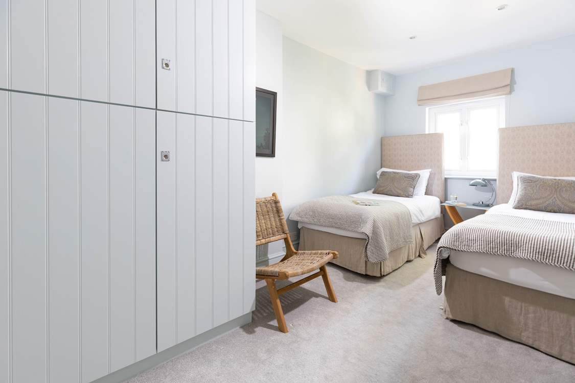 Bedroom 3 is a cosy twin bedroom.