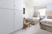 Bedroom 3 is a cosy twin bedroom.