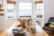 Enjoy a glass of wine with the gorgeous views from the kitchen/diner.