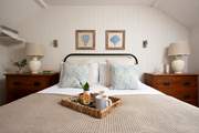 The gorgeous king-size bedroom with garden views.
