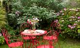 Enjoy a light lunch in the beautiful garden. - Thumbnail Image