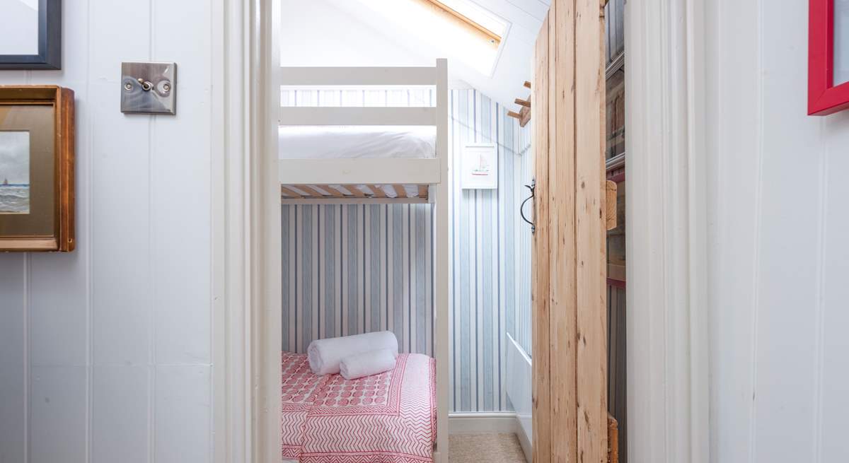 The small second bedroom with bunk-beds.