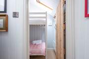 The small second bedroom with bunk-beds.