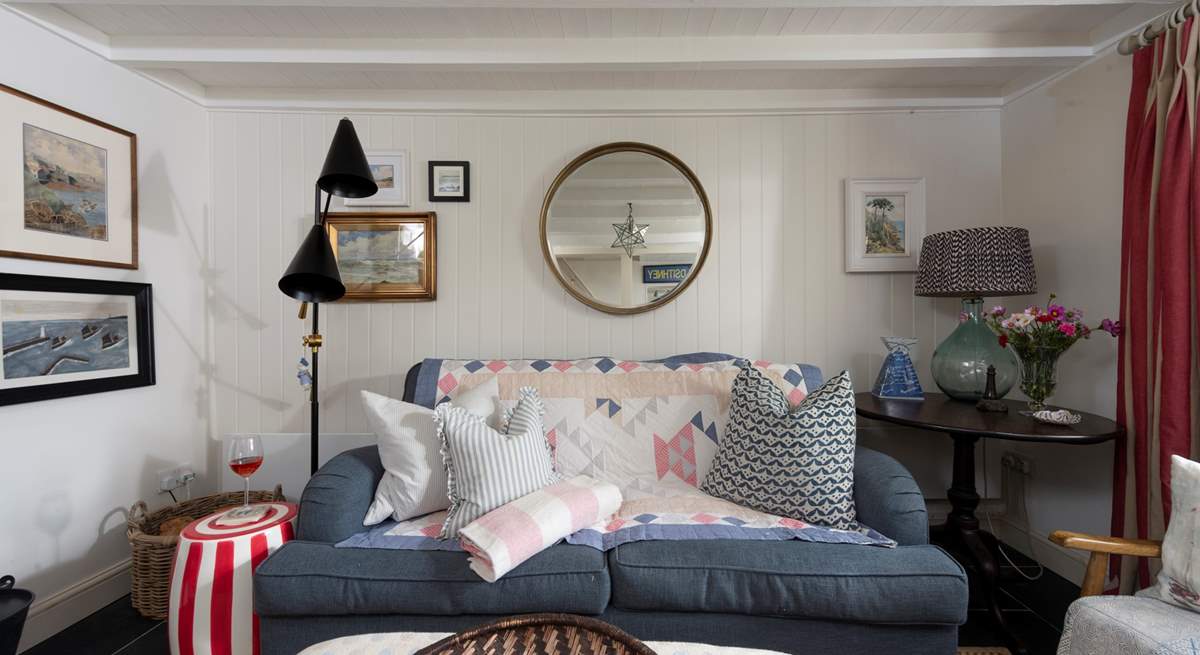 A cosy sitting-room with a 'sink into' sofa.