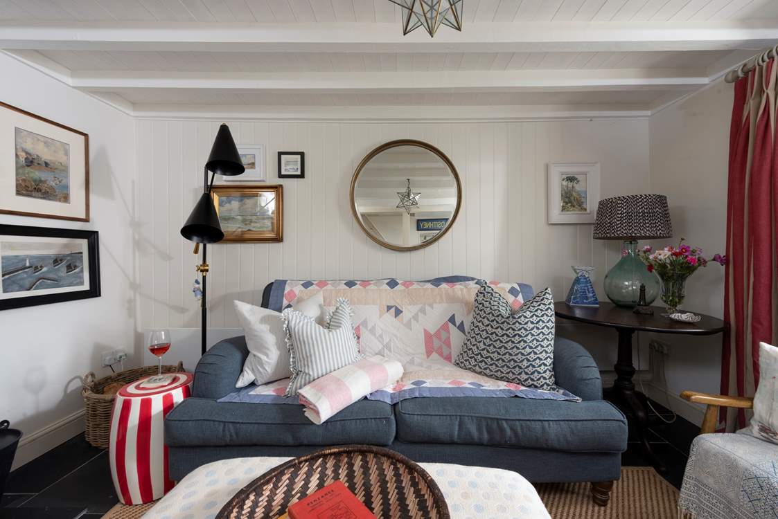 A cosy sitting-room with a 'sink into' sofa.