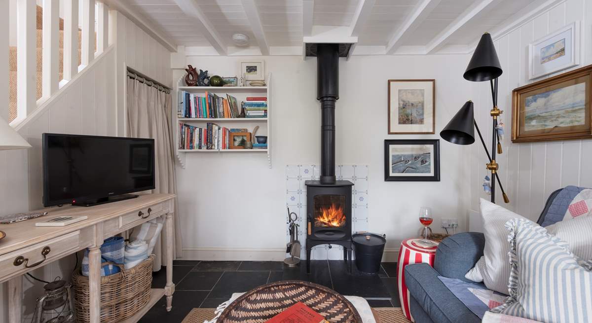 Light the fire, sit back and relax in this charming cottage.