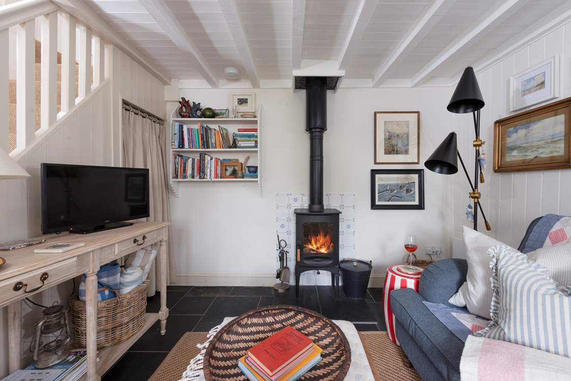 Light the fire, sit back and relax in this charming cottage.
