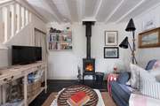 Light the fire, sit back and relax in this charming cottage.