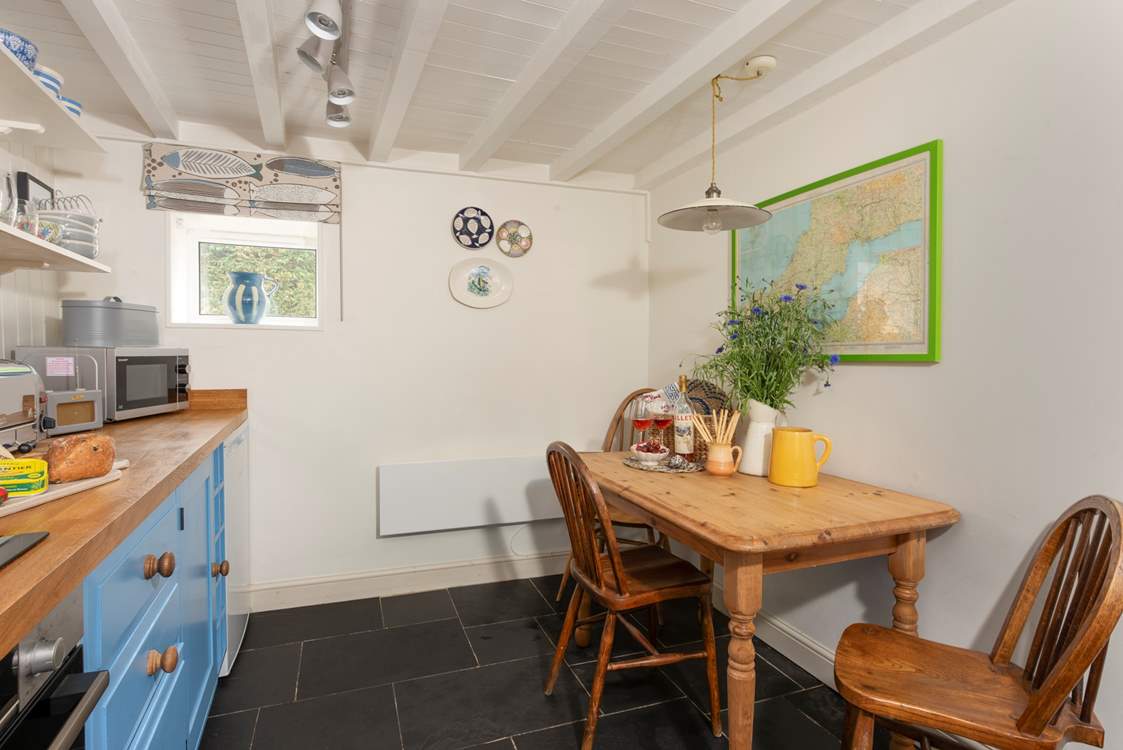 The sociable kitchen/diner comfortably seating 4 guests.