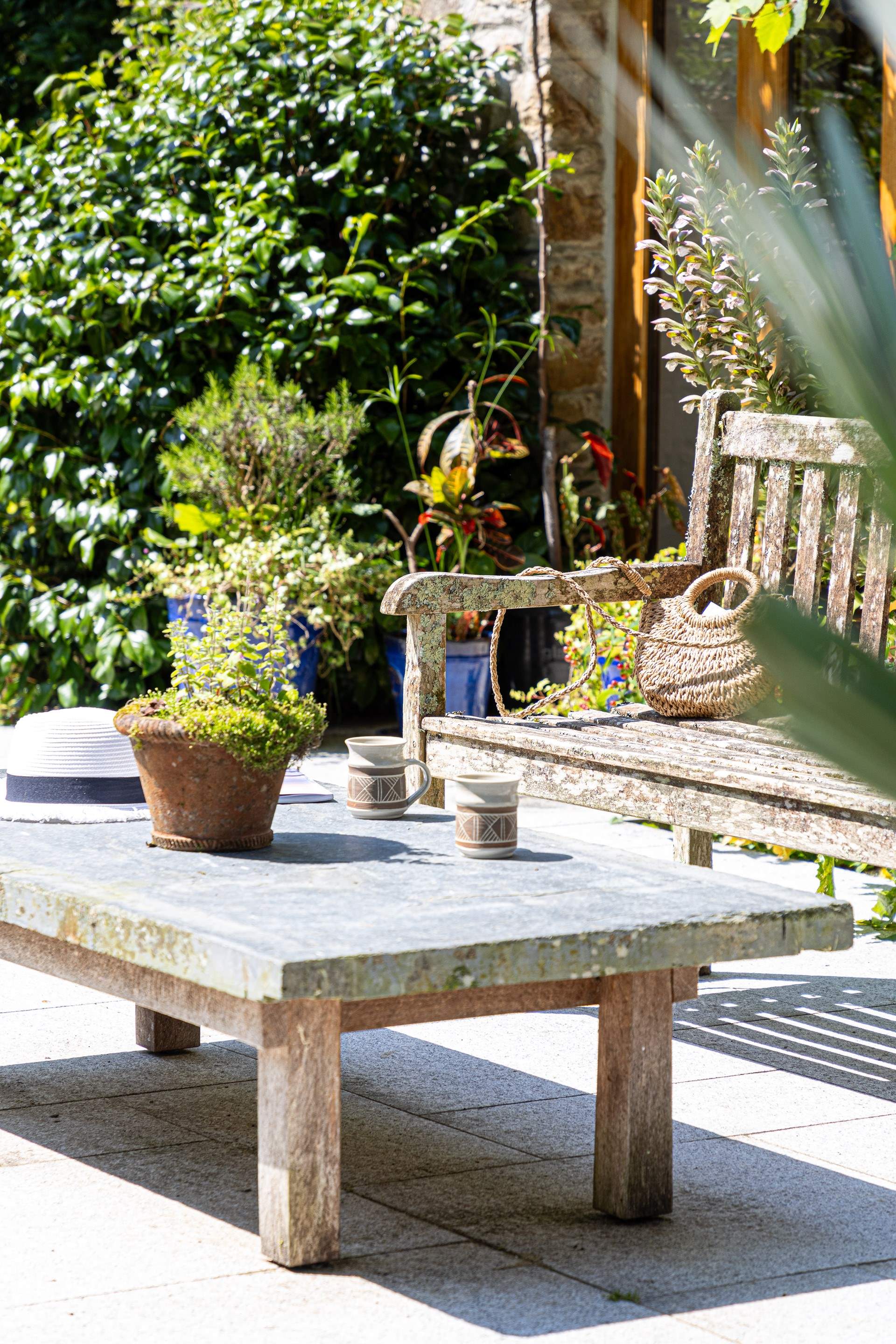 There's a choice of places to sit in the garden to watch the birds and wildlife.