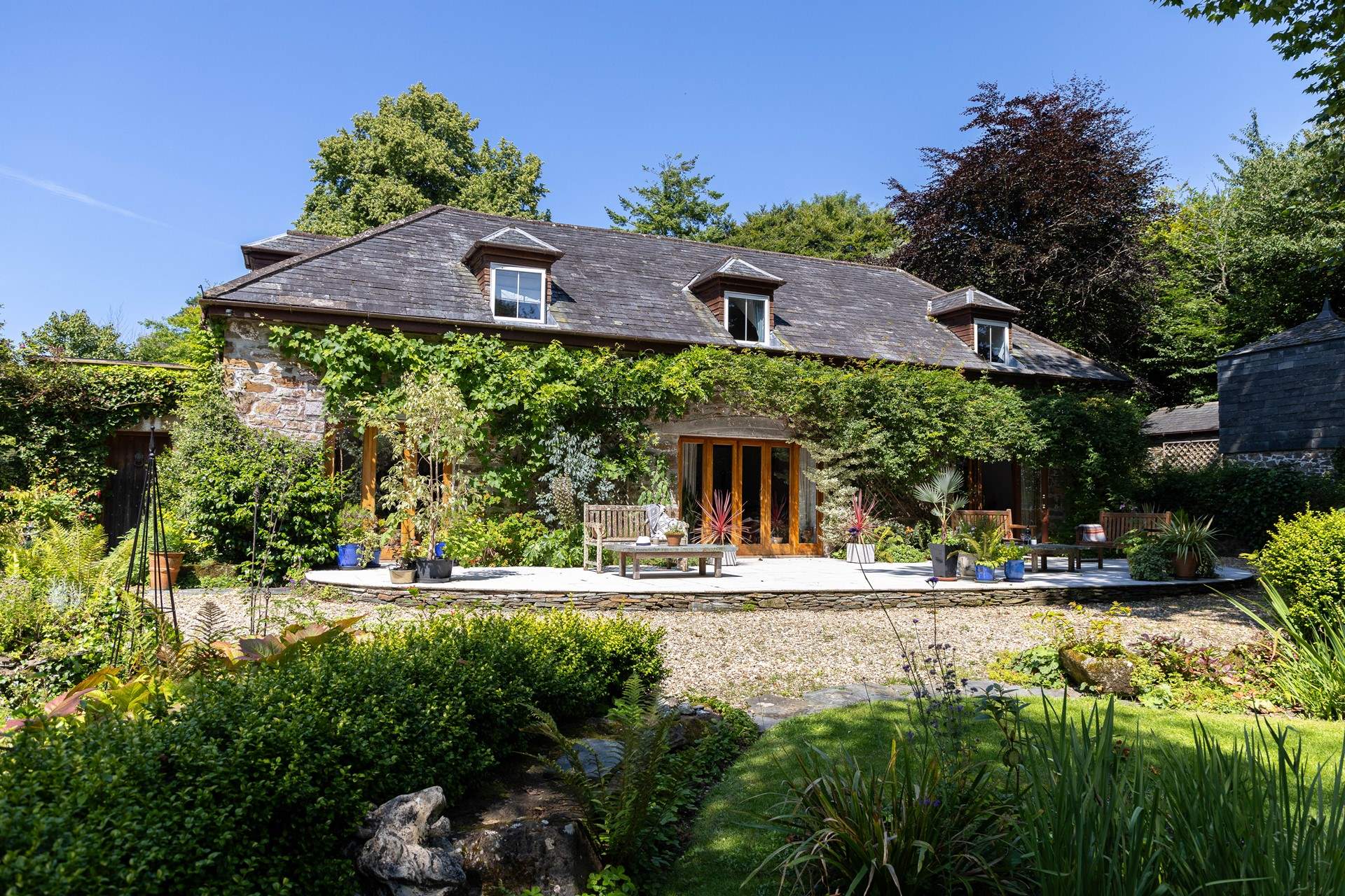 Coachman's Cottage occupies the right-hand side of the property next to the owners' home.