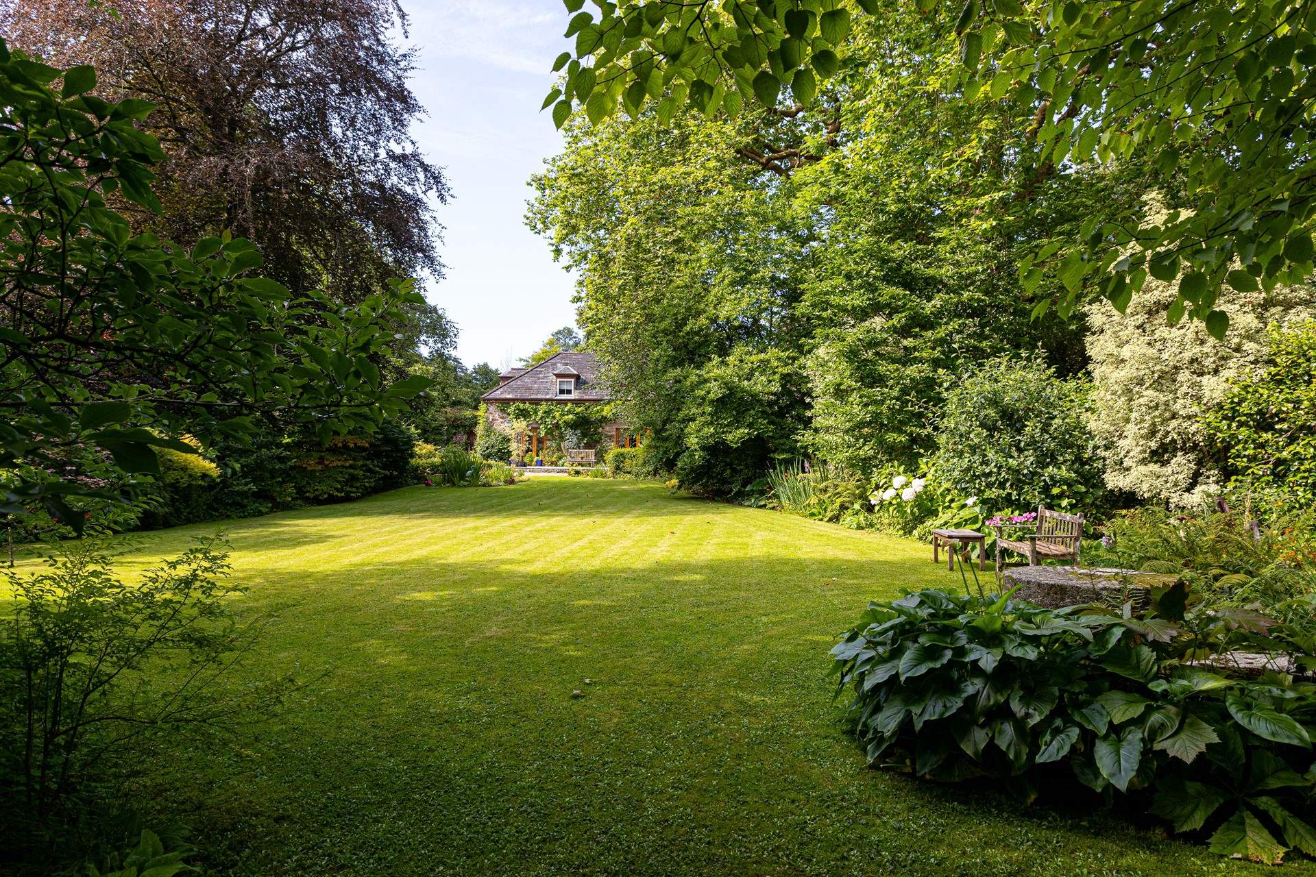 The large lawned-area will delight adults and children alike.