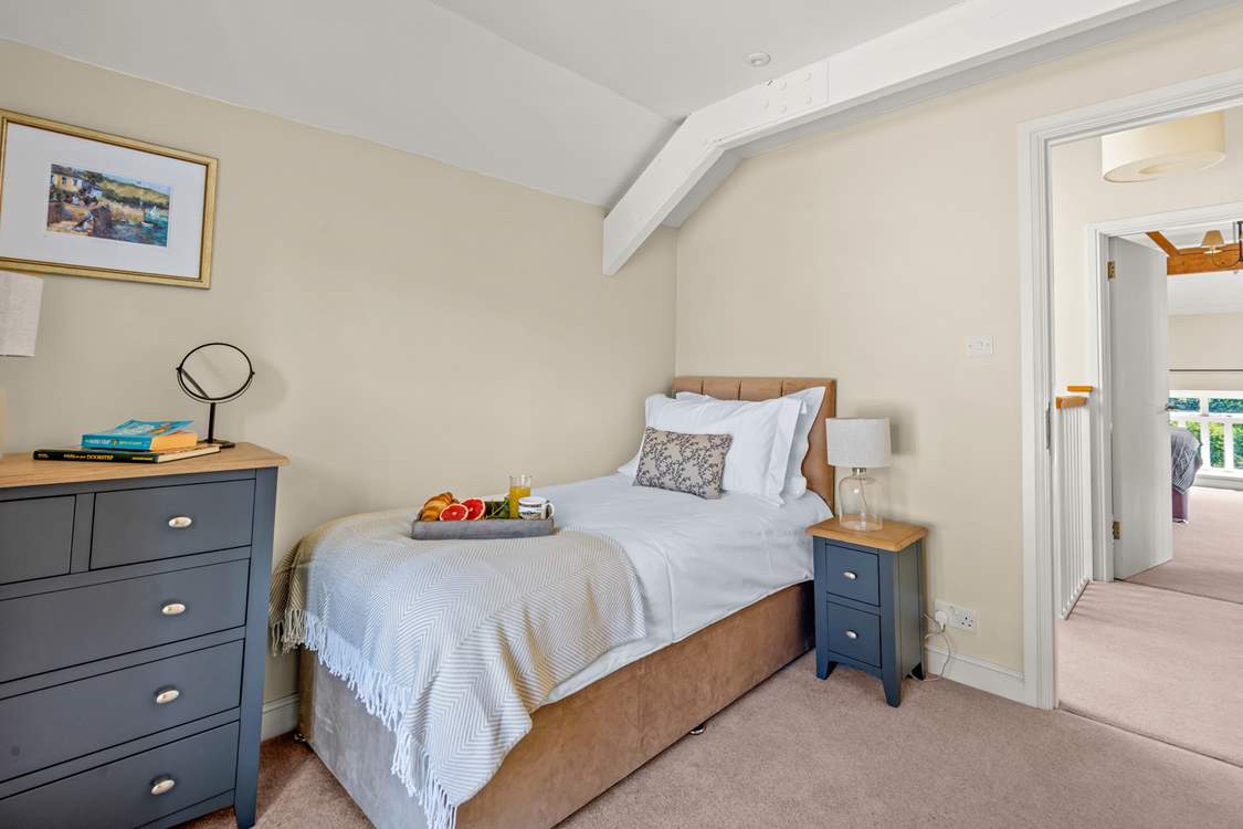 The perfect bedroom for one lucky guest seeking peace and comfort.