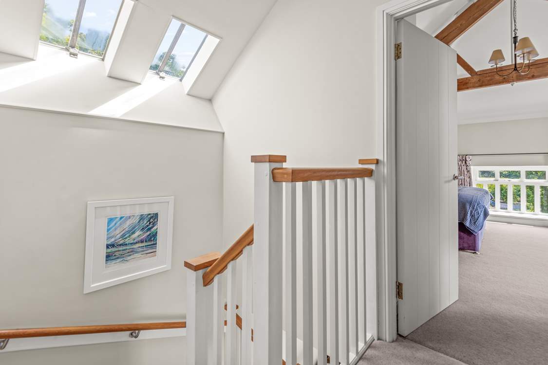Heading upstairs, the landing links both bedrooms and the bathroom neatly.