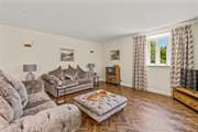 The living-room is fully equipped for comfort and relaxation.