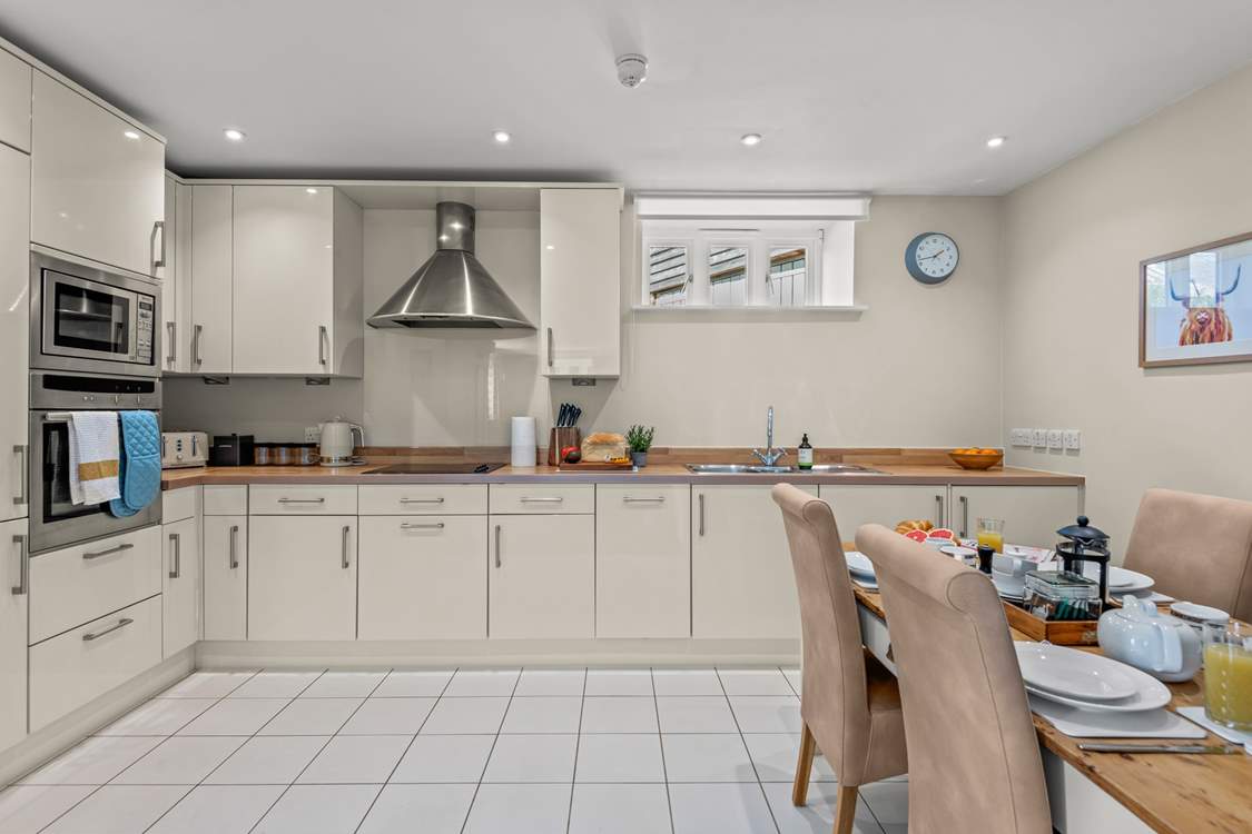The fully equipped kitchen is perfect for preparing any meal.