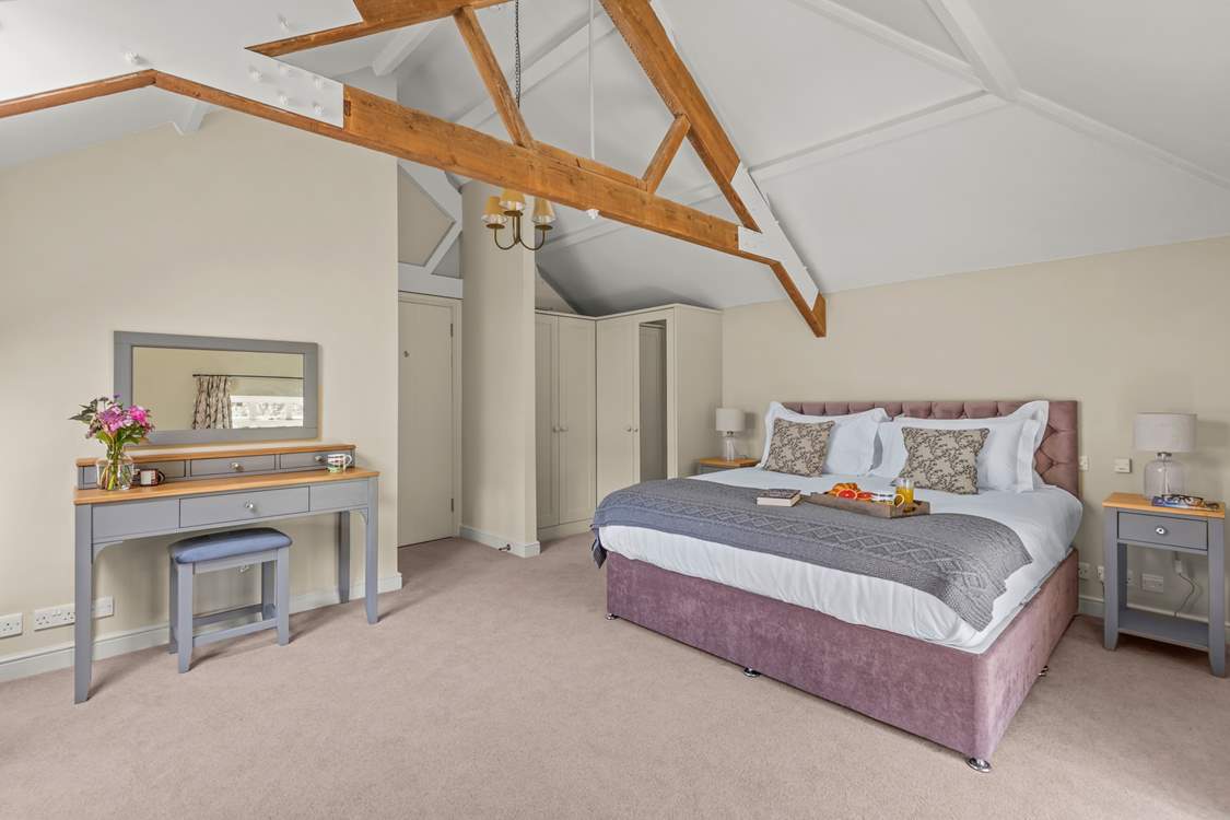Bedroom 1 boasts oodles of space and a magnificent super-king size bed.