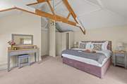 Bedroom 1 boasts oodles of space and a magnificent super-king size bed.