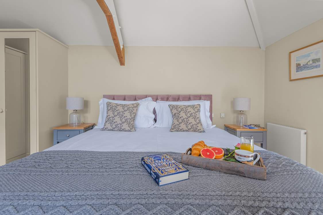 Bedroom 1 and its huge super-king size bed awaits.