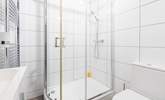 A modern bathroom complete with power shower to wash away the day. - Thumbnail Image