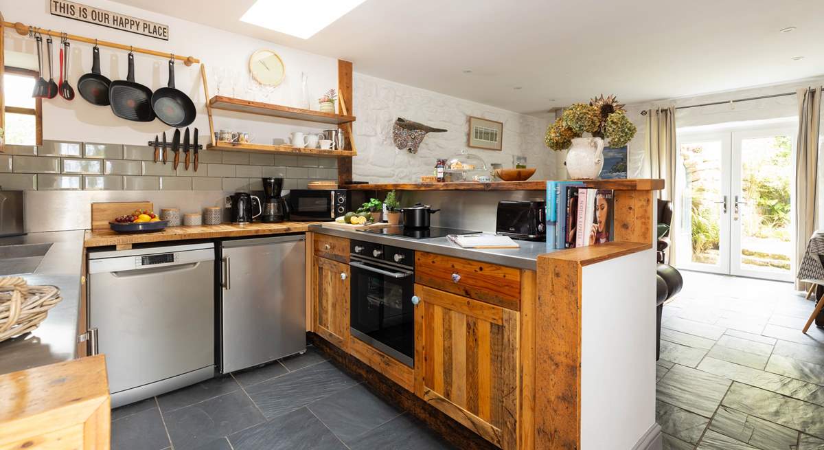 The charming kitchen is a social space to prepare dinner.