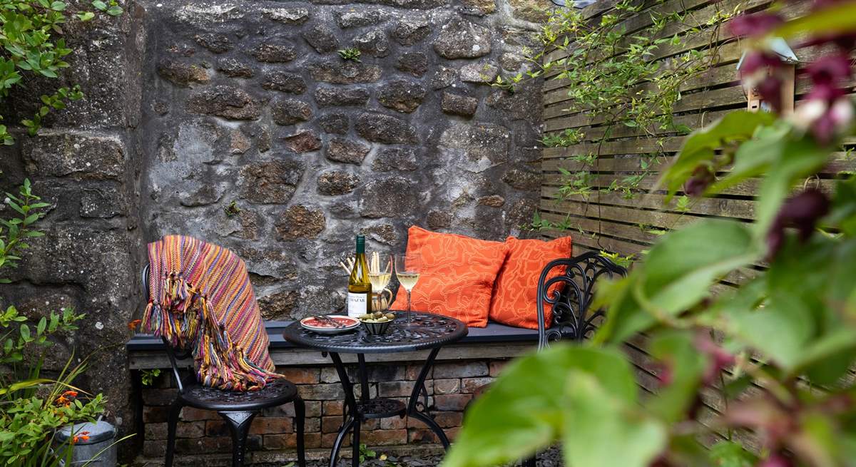 Enjoy dinner al fresco in the pretty secluded garden.