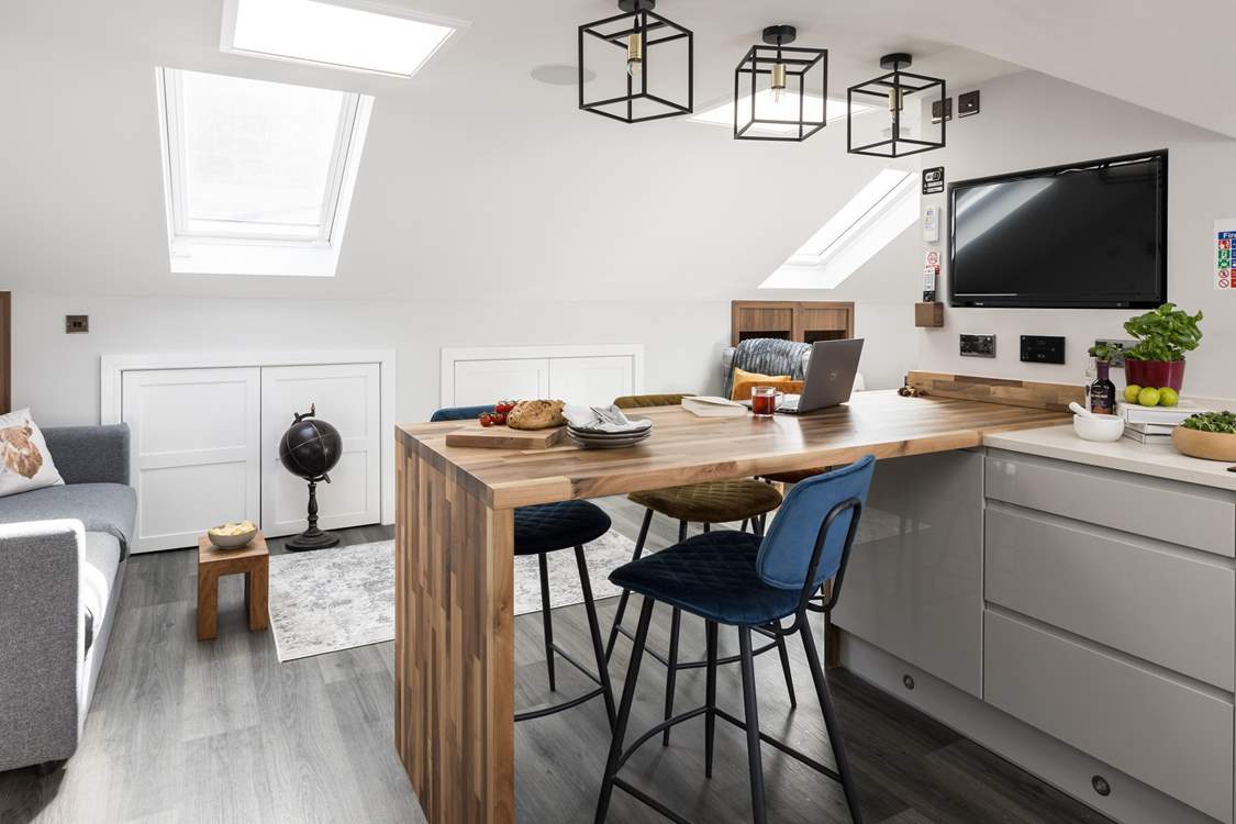 The breakfast-bar is perfect for sharing a meal or for catching up on any work.